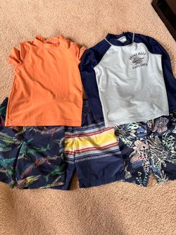 Swim shorts and rash guards kids size 6-7