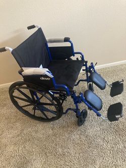Wheelchair,New with Elevating Footrests