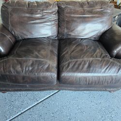 Brown loveseat