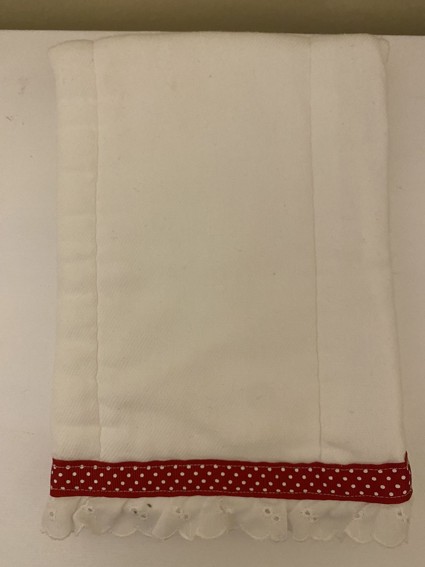 Baby burp cloth with red polka dot ribbon