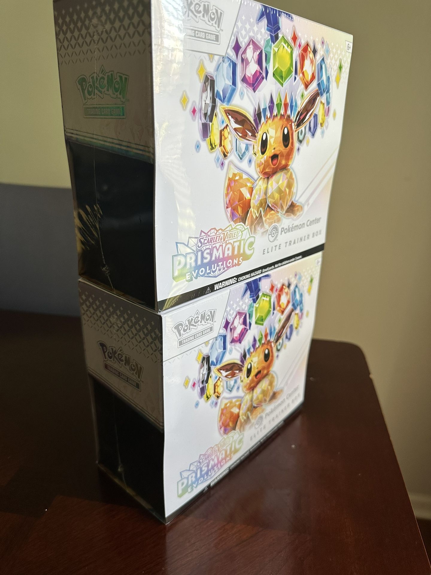 Prismatic Elite Trainer Box Price In Description
