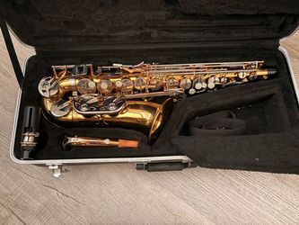 Alto Saxophone with Case and Accessories
