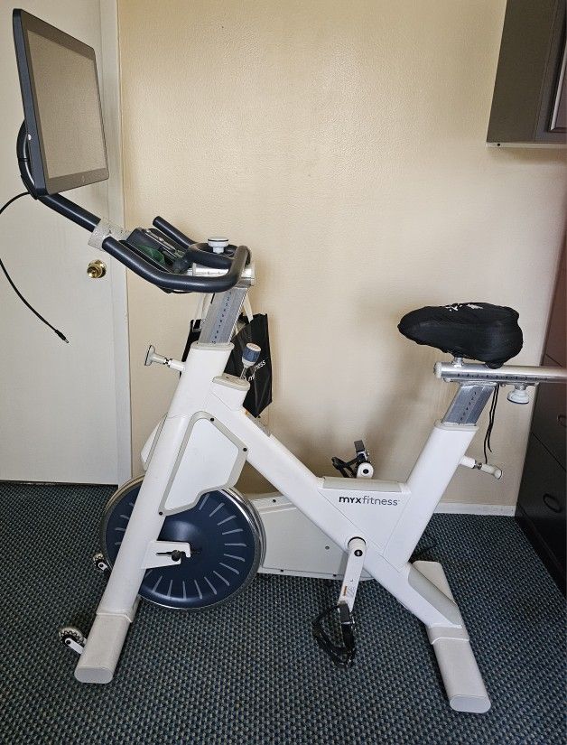 MYX FITNESS BIKE.....IT COMES WITH A 21 INCHES WIDE TABLET...NEW...$ 400