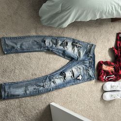 Off white pants and ripped skinny jeans