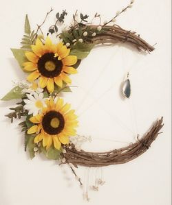 Floral crescent moon wreaths