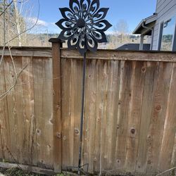 Large metal kinetic wind spinner sculpture