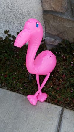 One dozen brand-new 27 in pink flamingos!