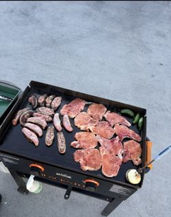 Black stone grill with gas tank