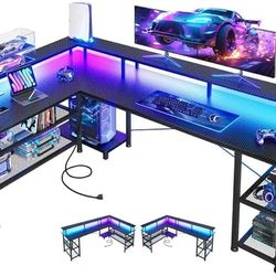 66" L Shaped Gaming Desk with Power Outlet and LED Lights, PC Gaming Table with Carbon Fiber Texture, Reversible L Shape Desk with Storage Shelves & M