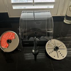 Culinary Food Processor- Brand new blade holder comes with dual sided grater blade and adjustable slicer.