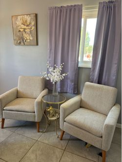 2 chairs and glass table