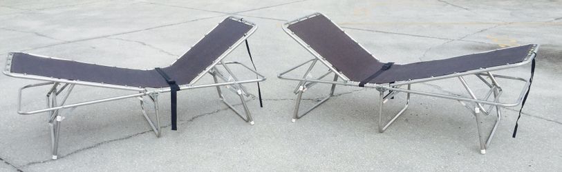 Two folding cots