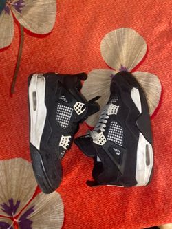 Air Jordan 4 Black and White Sneakers