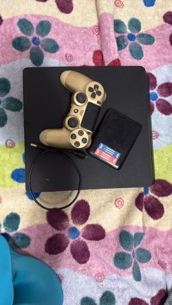 PS4 With gold Controller And 1 TB Hard Drive With Games !