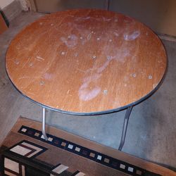 Round wooden folding table