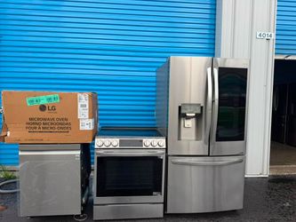 Complete LG kitchen set. Stainless steel stove, refrigerator, microwave, dishwasher.