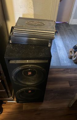 Two 12s in fitted box and Amps
