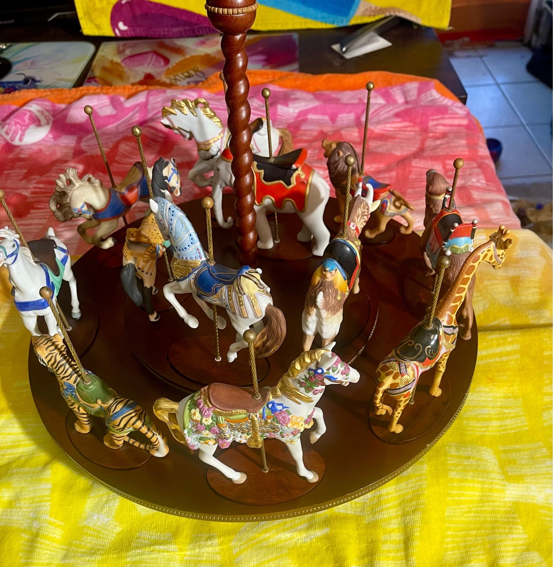 Colorful horse and other animals porcelain carousel