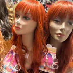 Two beautiful  wigs one is lighter with high lights