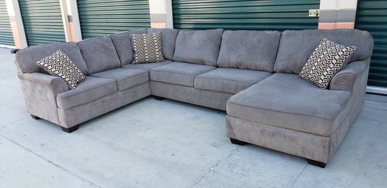 Three Piece Grey Sectional Couch