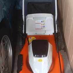 stihl 36 volt  cordless lawn mower with rear bagger works great  needs a new battery model RMA-510 used very little with charger still like brand new 