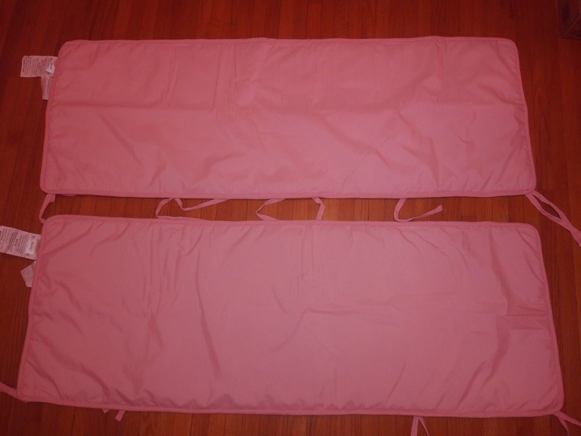 2 Used Pink Padded Crib Rail Covers