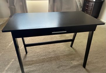 Black writing desk with drawer