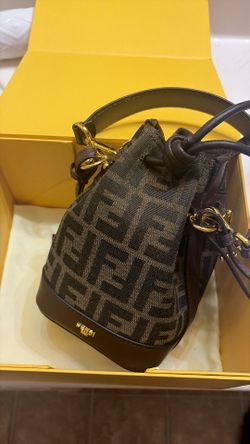 brown Fendi Mon Tresor Mini Bucket Bag featuring the iconic FF jacquard fabric and brown leather trim