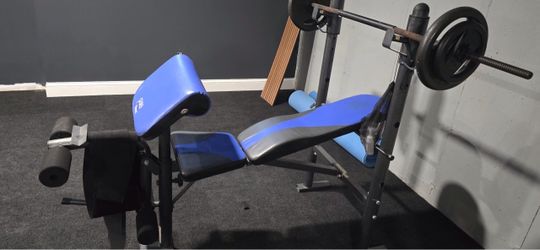 Weight Bench with chest press bar and weights