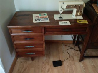Vintage singer sewing machine and table