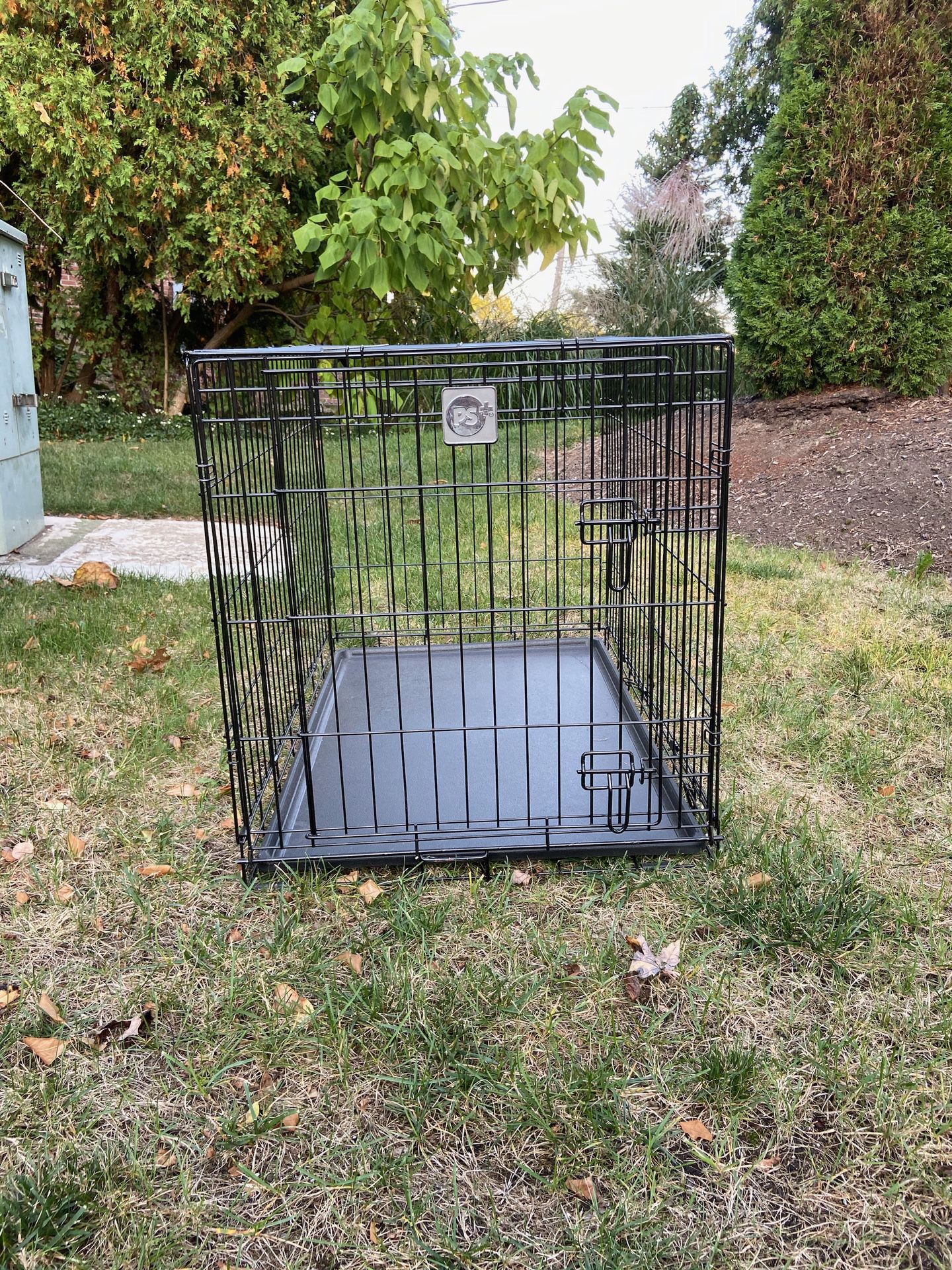 Large dog crate Pet Supplies Plus$60 obo