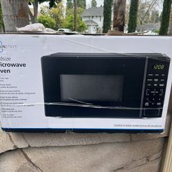Mainstays 1.1 Cu ft Countertop Microwave Oven, 1000 Watts, Black, New As Is 