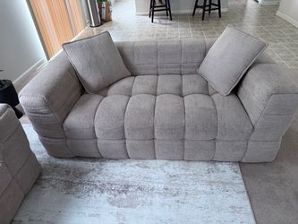 Light brown 2-seater couch