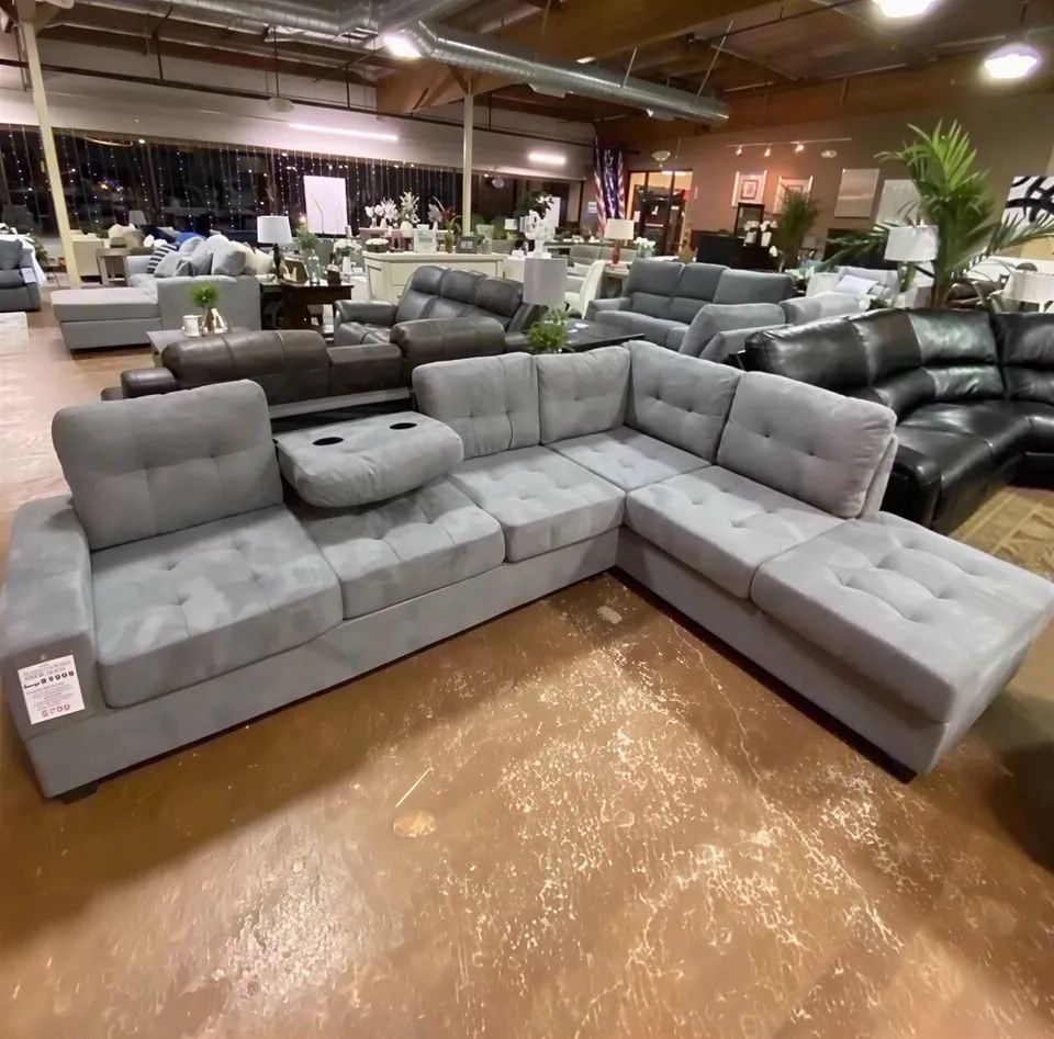 Reversible Sectional With Drop Down Cup Holders