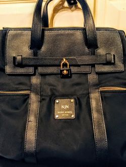 Henri Bendel Jetsetter Convertible Backpack – Black Leather & Gold
- Luxury