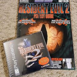 Resident Evil 2 for PS1, Dual Shock,  Pristine condition, with Perfect Guide Walk-through book. CIB