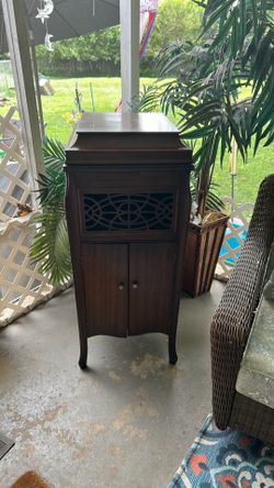 This is antique cabinet photograph cabinet