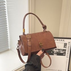 Brown faux leather purse