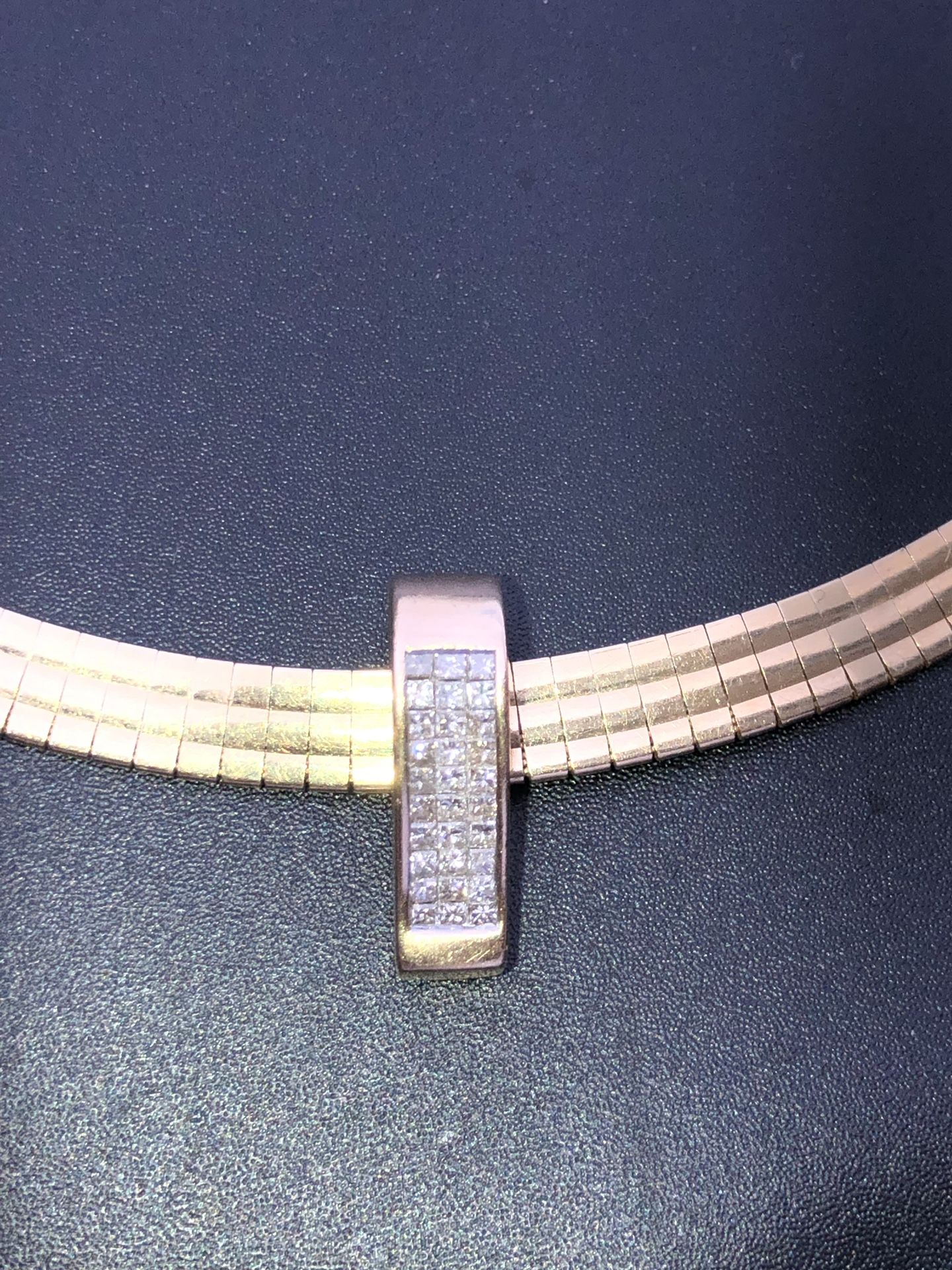 Reversible diamond slide charm