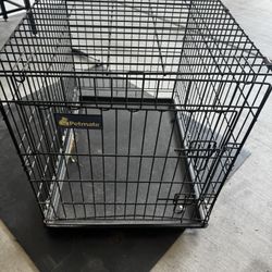 Medium Dog Crate. Been Used Works As It Should 