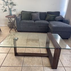Glass coffee table with wood detail