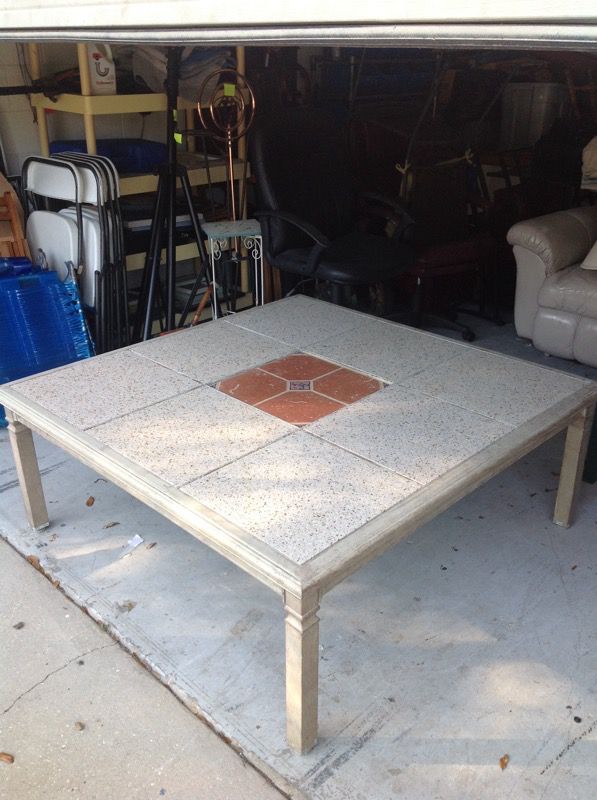 Patio coffee table with tile inlay
