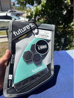 Surfboard fins