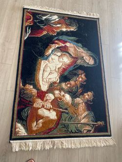 Floor or wall rug