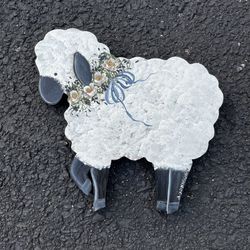 hand-painted wooden decorative sign of a sheep