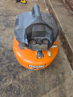 RIDGID
6 Gal. 150 PSI Portable Electric Oil-Free Jobsite Pancake Air Compressor with Dual Pressure Gauges and 2-Quick Couplers