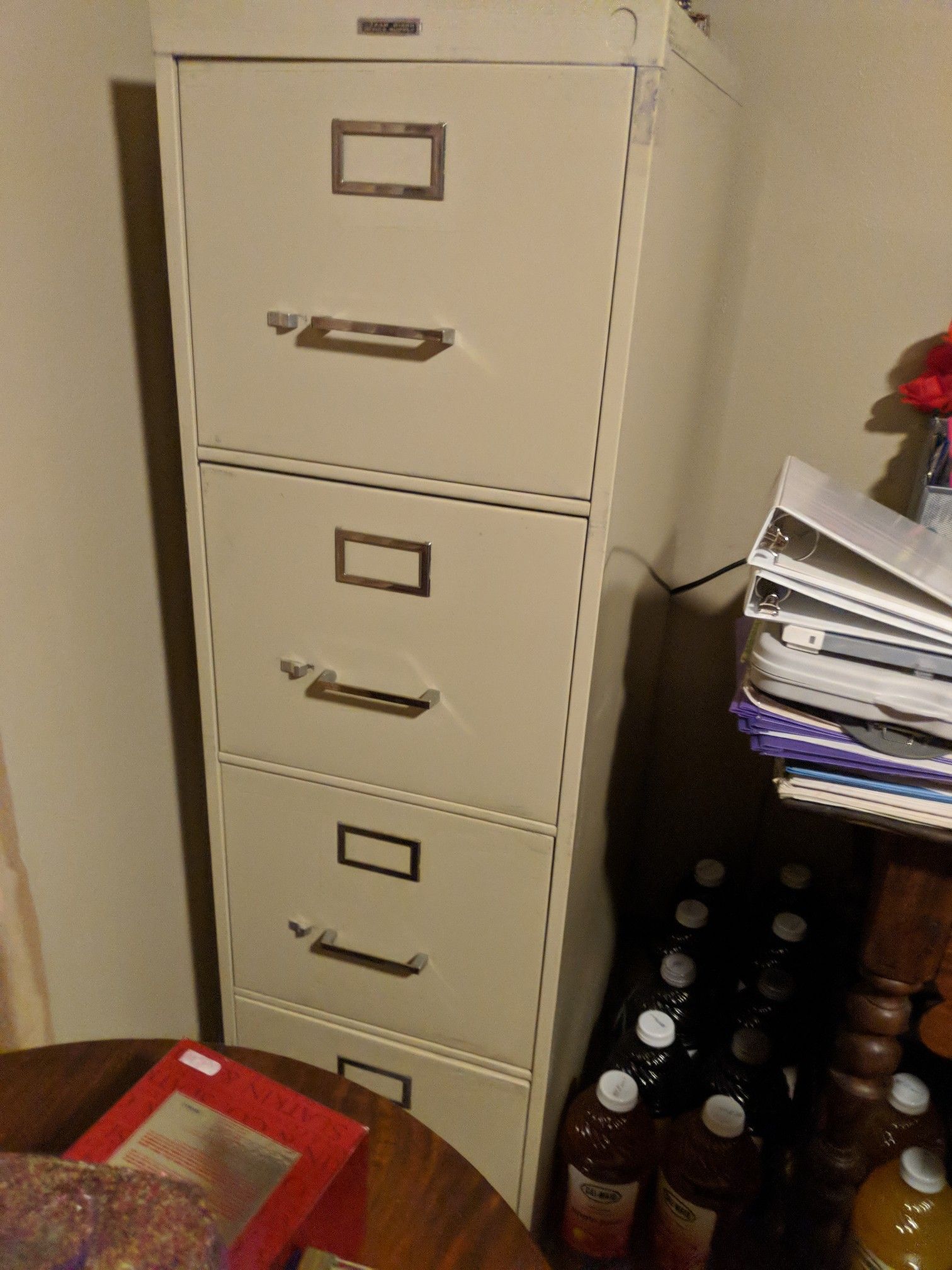 Four drawer metal filing cabinet