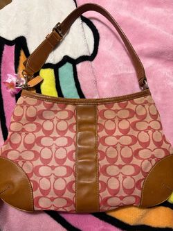 Pink and brown coach purse