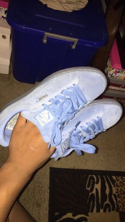 Icy blue Pumas size 9