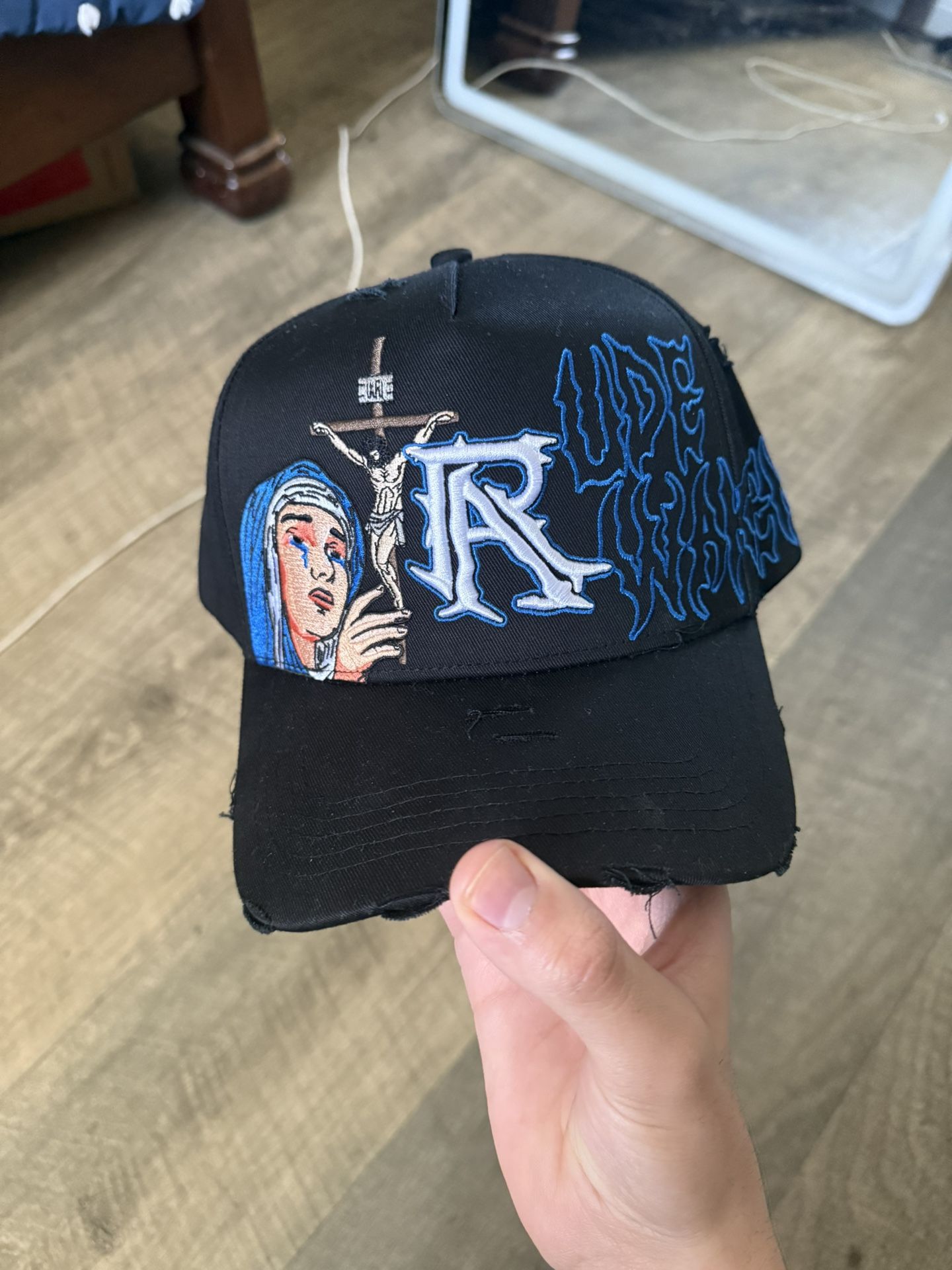 Rude Awakenings Hats Crucifixion